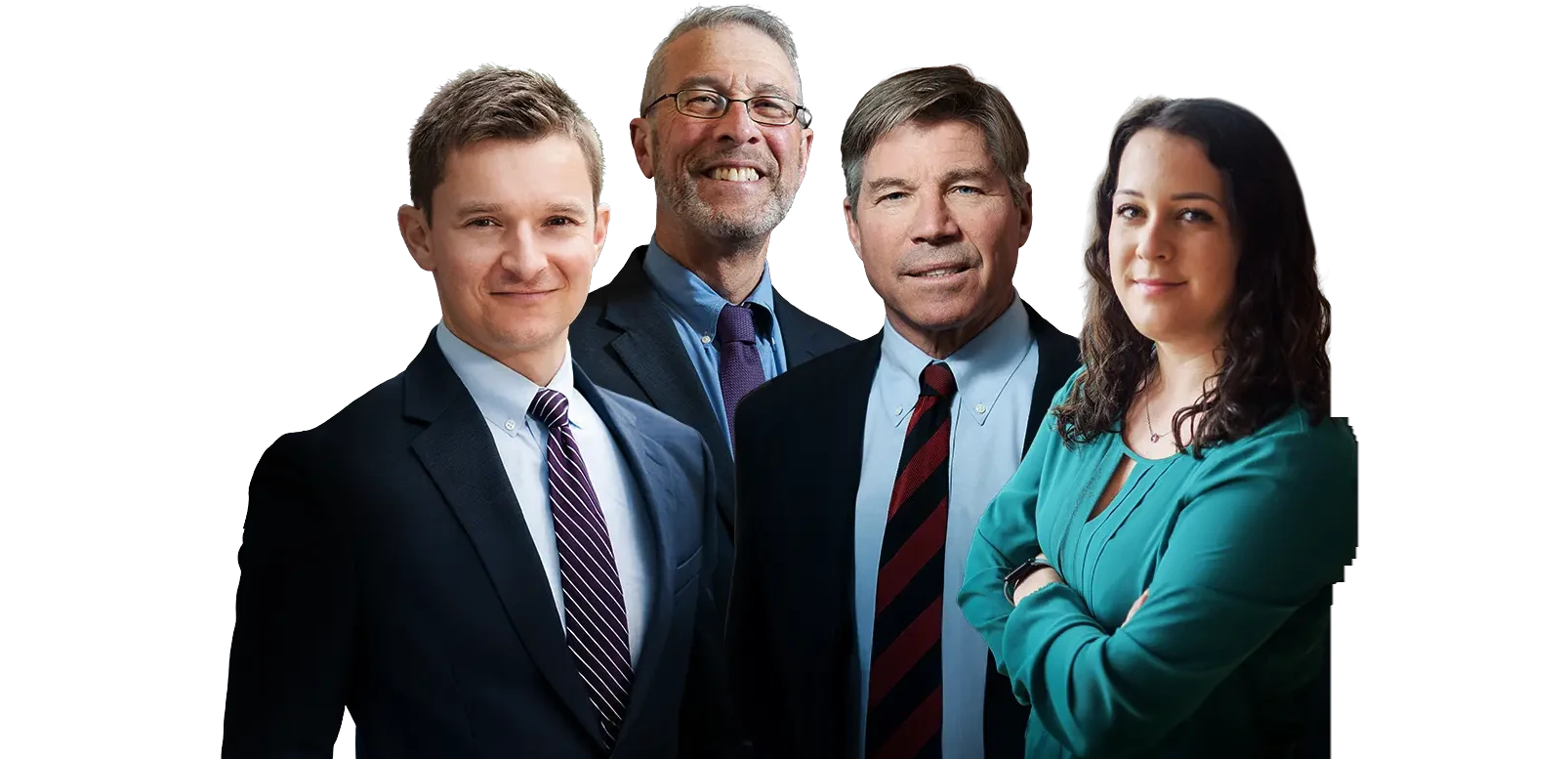 Group of four professionals in business attire posing together for a team photo against a dark background